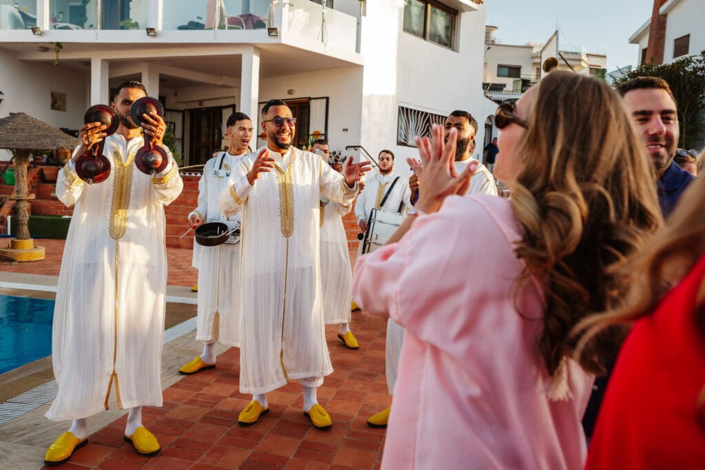 drummers arriving captured in wedding photography in Tangier, Morocco by Ben Lee.
