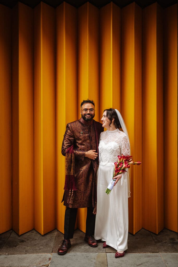 Bride and groom smiling at their cinema wedding in Manchester, captured by Ben Lee Photography