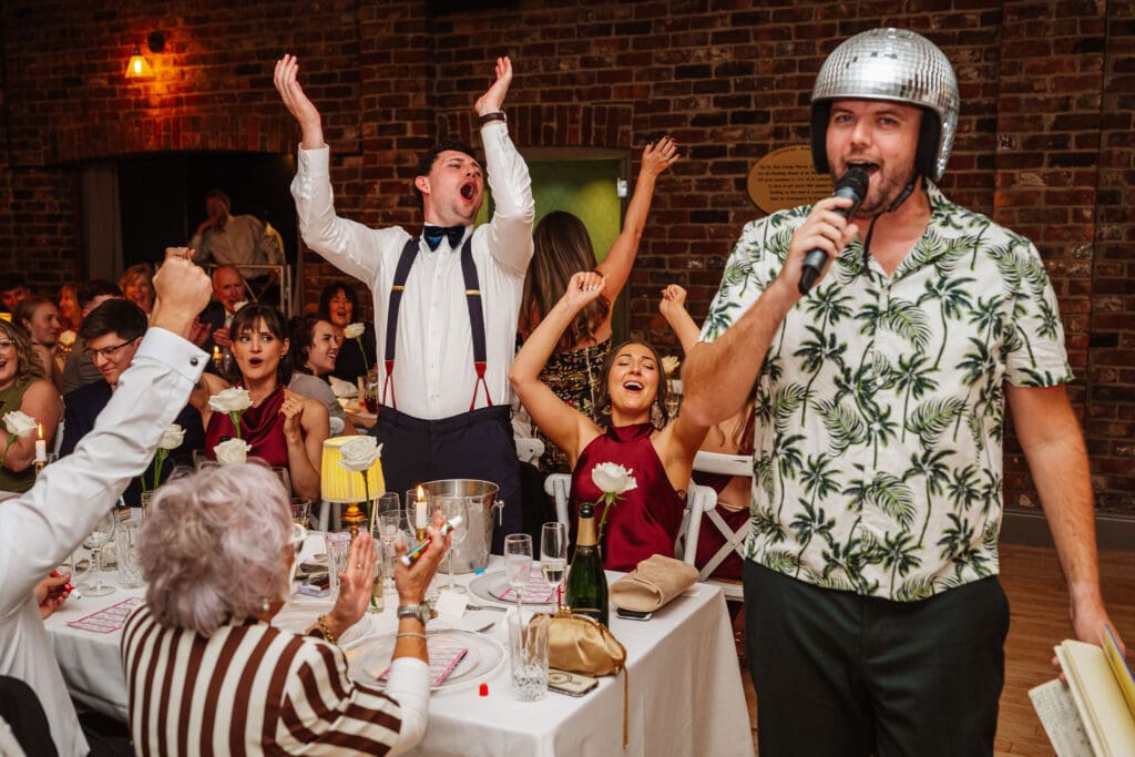 disco ball hat at a fun wedding, captured by Ben Lee Photography