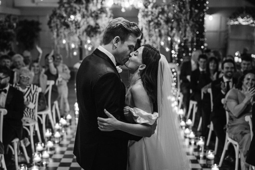 bride and groom kiss at wedding captured by Ben Lee Photography