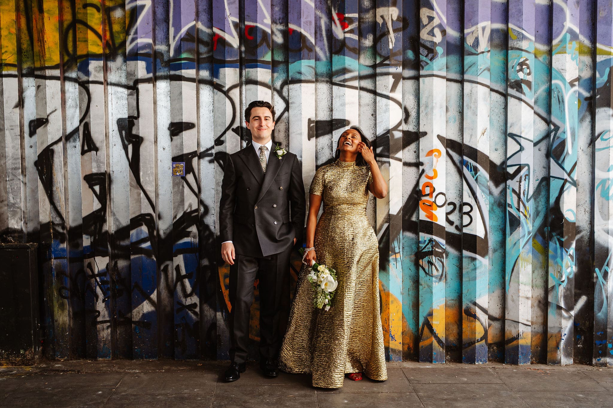 Ben and Meleesha enjoying their street photography photoshoot before their wedding at the Libertine. Captured by Ben Lee Photography.